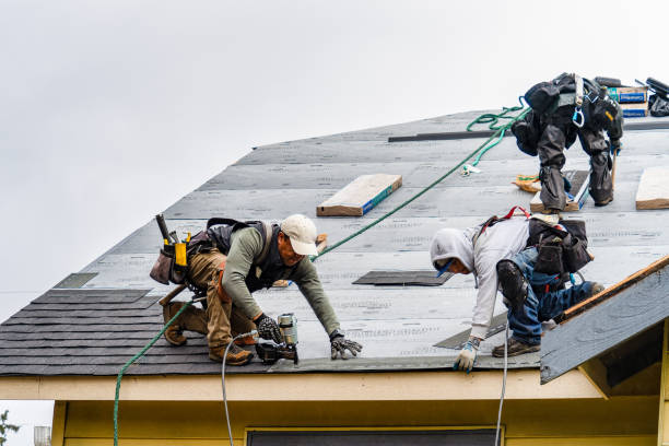 Professional Gutter Installation technician working in Richford, VT